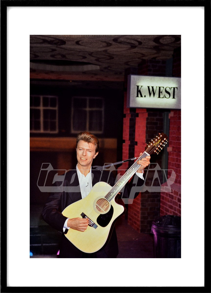 DAVID BOWIE - photocall to accounce the re-issue of Ziggy Stardust with a recreation at the Rainbow Theatre of 14 Heddon Street in London where the original album cover was photographed - the Rainbow Theatre London UK - 23 Jan 1990. Photo: © George Chin/IconicPix