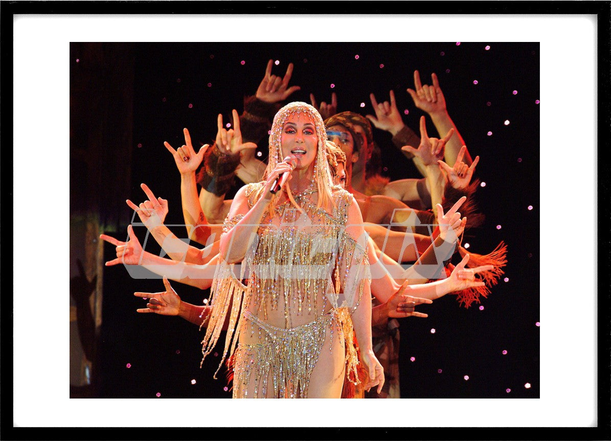 CHER - performing live in concert on her Farewell Tour at Wembley Arena in London UK - 22 May 2004. Photo: © George Chin/IconicPix