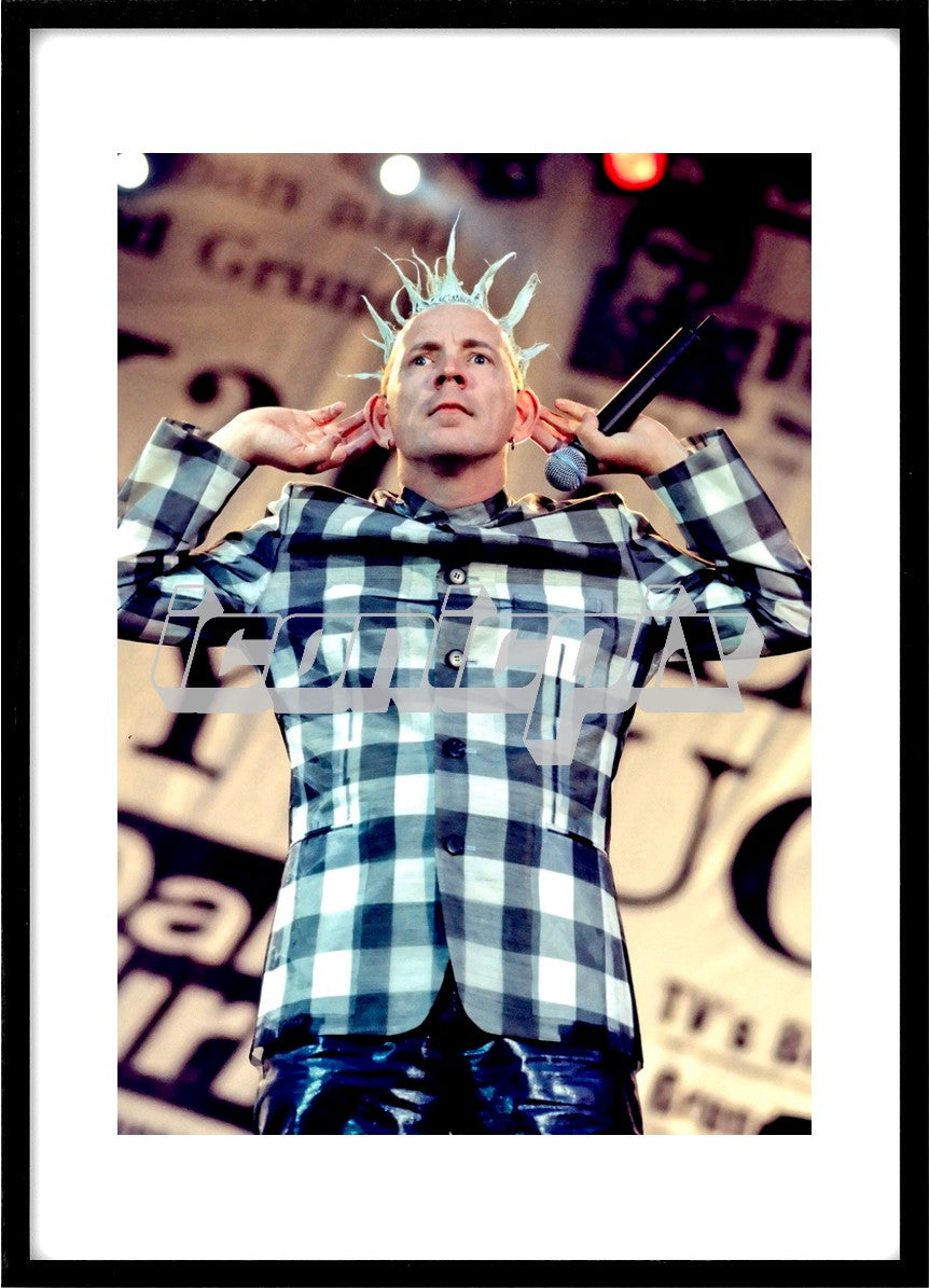 SEX PISTOLS Re-Union - vocalist Johnny Rotten performing live for the first time since 1977 on the Filthy Lucre Tour in Finsbury Park London UK - 23 Jun 1996. Photo credit: George Chin/IconicPix