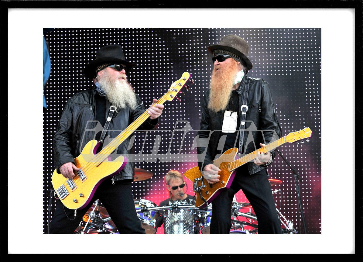 ZZ Top - bassist Dusty Hill and guitarist Billy Gibbons performing live on Day Three on the Main Stage at the 2009 Download Festival, Donington Park, Leicestershire, UK - 14 Jun 2009. Photo: © George Chin/IconicPix
