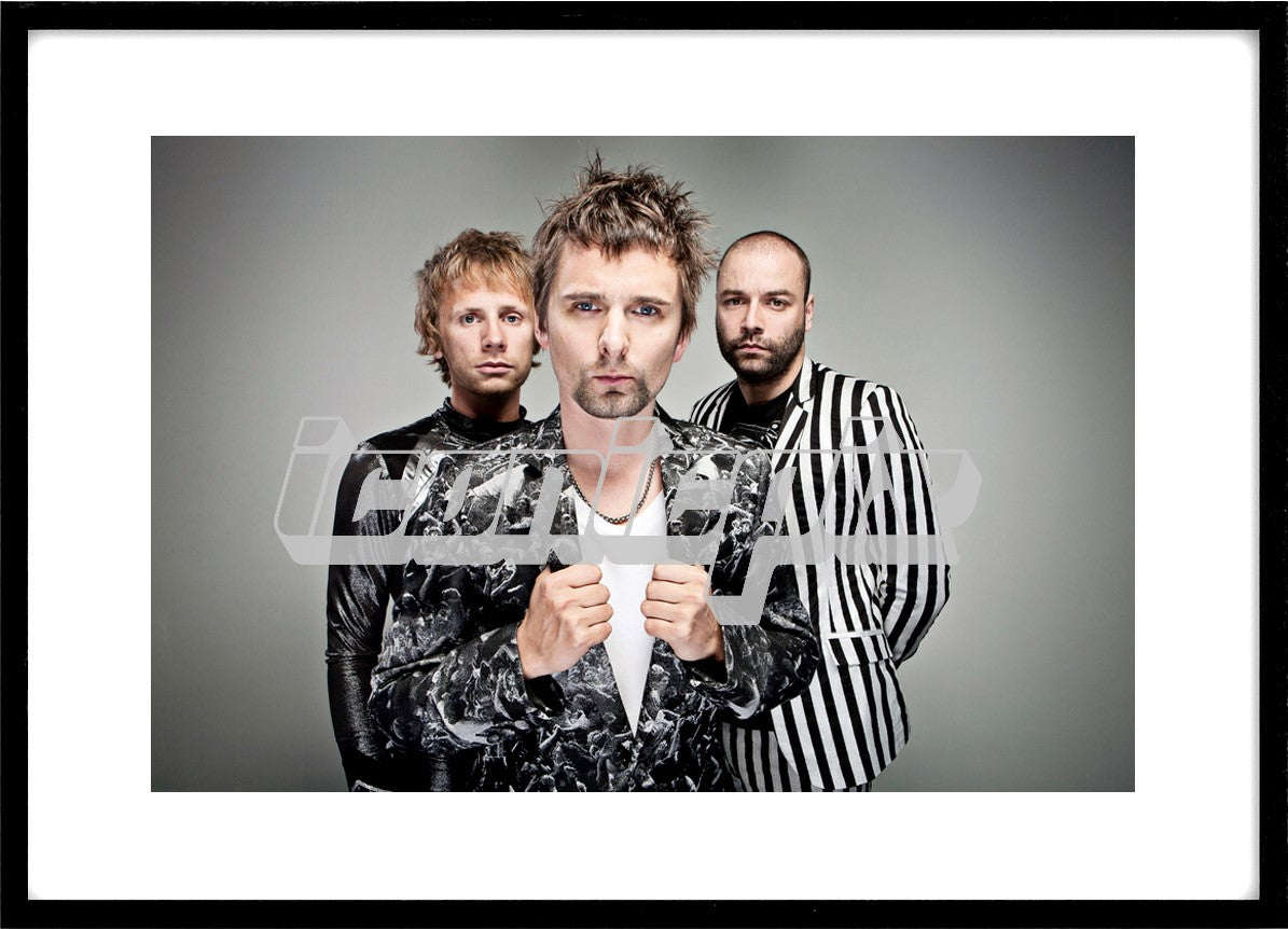 MUSE - L-R: Dominic Howard, Matthew Bellamy, Christopher Wolstenholme - Exclusive Portraits of Muse in Manchester UK - Sep 3, 2010.  Photo credit: Ashley Maile / IconicPix  