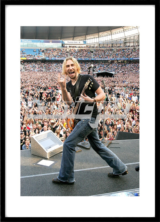 NICKELBACK - vocalist and guitarist Chad Kroeger performing live on the All The Right Reasons Tour at the Manchester City Stadium in Manchester UK - June 4, 2006.  Photo: © Ashley Maile / IconicPix