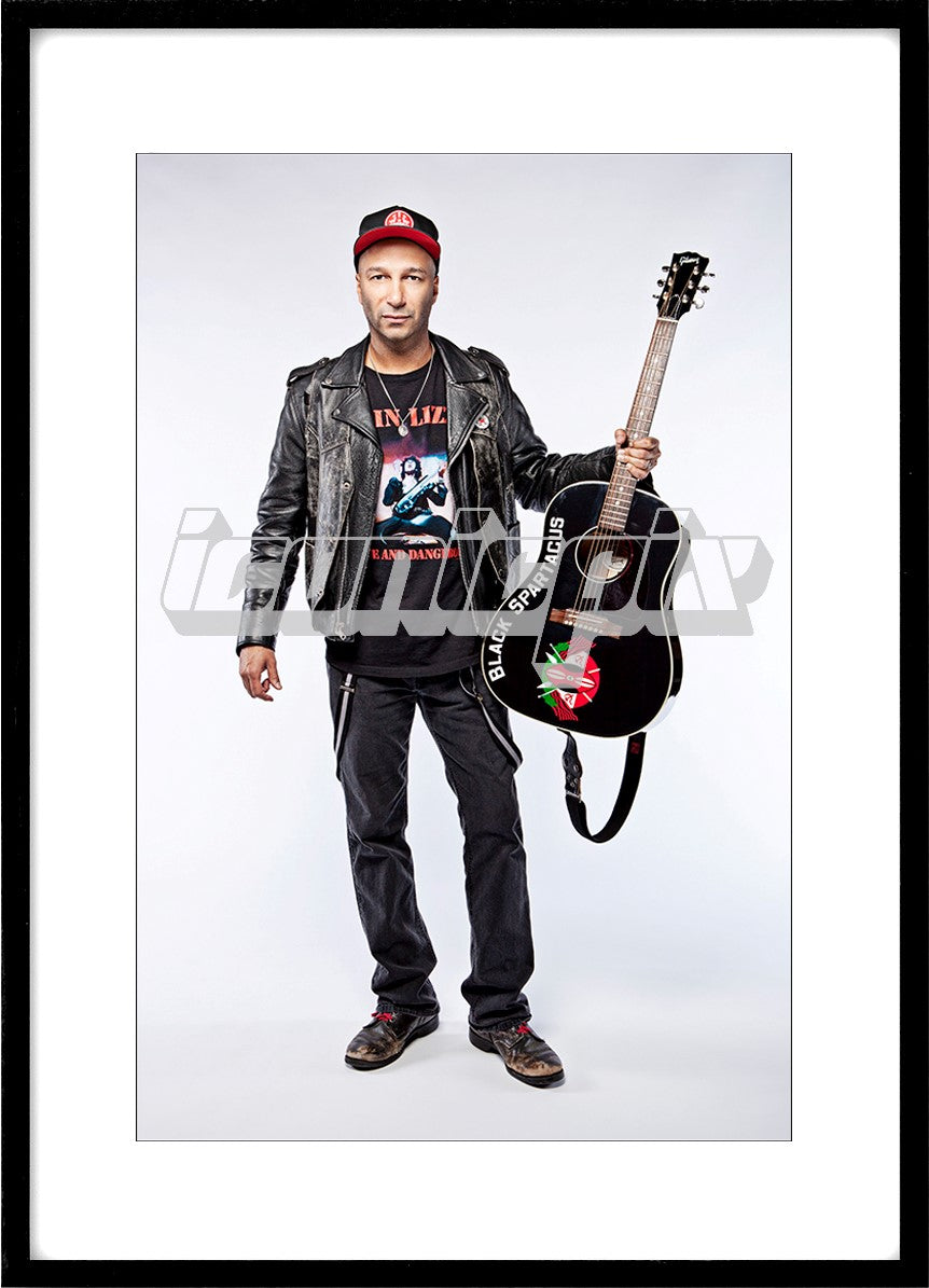 TOM MORELLO - currently guitarist of Rage Against The Machine and Street Sweeper Social Club photographed with a Gibson acoustic guitar in Nottingham UK - Nov 2, 2011. Photo: © Ashley Maile / IconicPix
